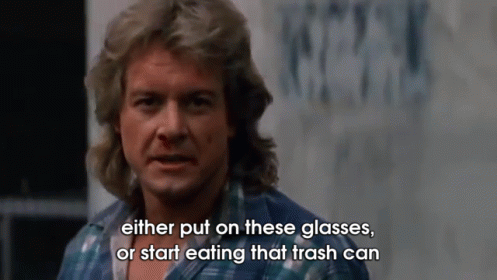 Gif named either put on these glasses or start eating that trash can